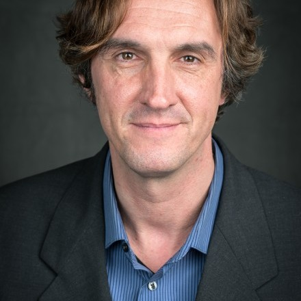 Portrait of Charlie Castell, founder and CEO of PubRev+.