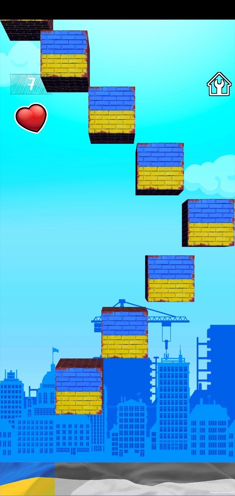 Rebuild Ukraine gameplay with blue-and-yellow building blocks.